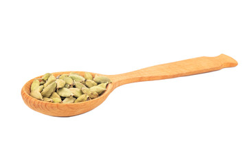 Dry cardamom in spoon
