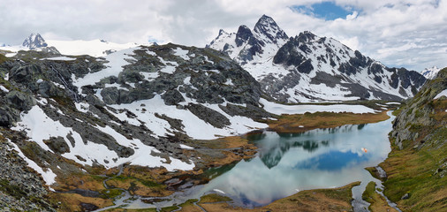 Amazing turquoise Lake on the way to Rutor Glacier, Aosta Valley, Italy