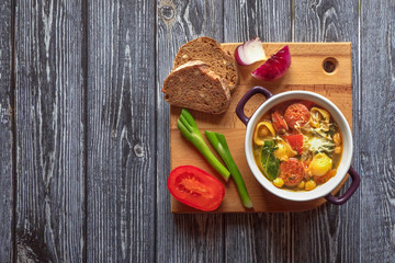 Hot soup with chickpeas and chorizo sausage