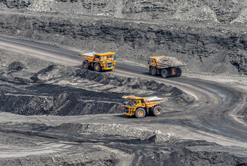Large quarry dump truck. Transport industry.