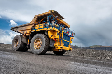 Large quarry dump truck. Transport industry.