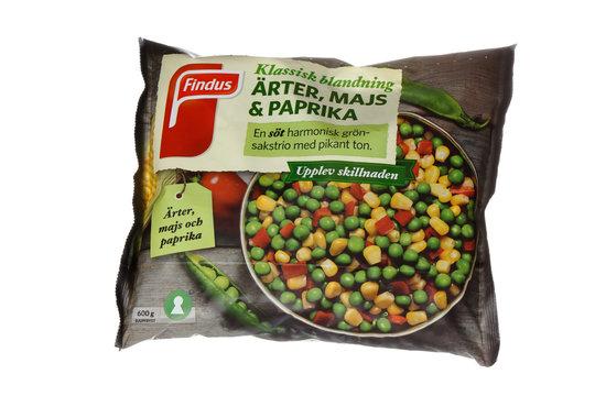 Stockholm, Sweden - February 4, 2017: One package with Findus vegetable mixture of frozen corn,peas and pepper for the Swedish market isolated on white.