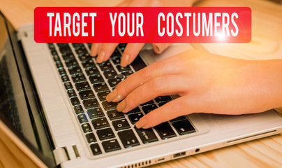 Text sign showing Target Your Costumers. Business photo text Specific Range and Interest Potential Users and Buyers woman laptop computer smartphone mug office supplies technological devices