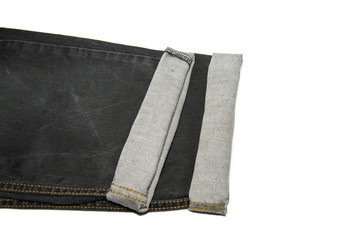 Isolate of black jean texture with leg fold