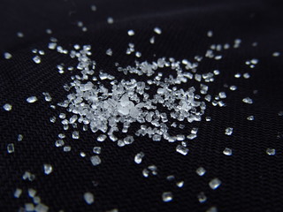 sprinkled sugar on dark background