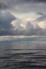 Large waves of sea and dark clouds