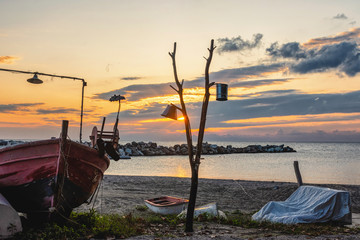 Sunrise on the Aegean, fishing boats on the shore, old fishing boats, Pelion Peninsula, Greece