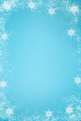 snowflakes on blue background.
