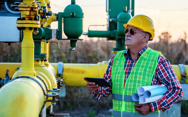 Engineer make inspection on the fuel supply systems. Concept of industry