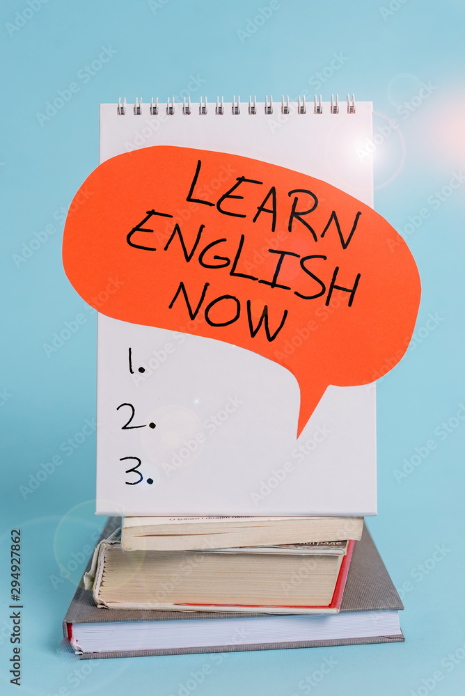 Poster writing note showing learn english now. business concept for gain or acquire knowledge and skill of 
