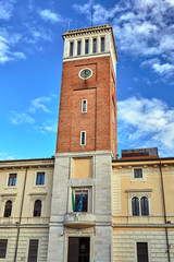 Fototapeta premium Renaissance building with a brick tower in the city of Grosseto, Italy.
