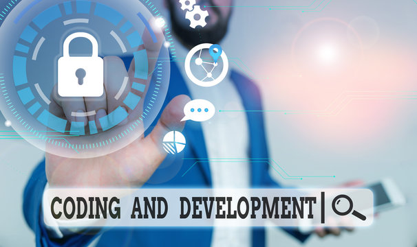 Text sign showing Coding And Development. Business photo text Programming Building simple assembly Programs Male human wear formal work suit presenting presentation using smart device