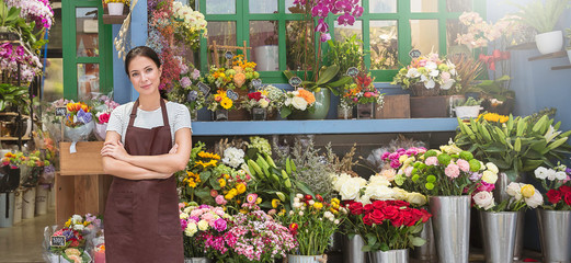 Startup successful sme small business entrepreneur owner asian woman standing with flowers at...