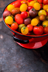 Cherry tomatoes. Summer useful vegetable for vegetarians. Variety of colors and tastes.