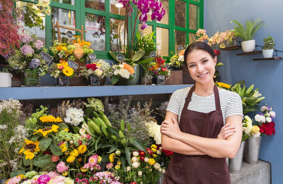 Startup Successful Sme Small Business Entrepreneur Owner Asian Woman Standing With Flowers At Florist Shop. Portrait Of Caucasian Girl Successful Owner Environment Friendly Concept With Copy Space