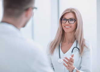 close up. woman doctor talking to colleague