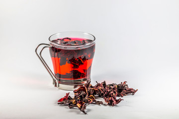Natural Hibiscus tea in cup - obrazy, fototapety, plakaty