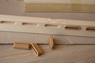 Furniture assembly parts and tools for self assembly furniture, on the floor