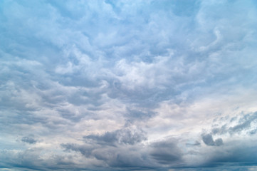 Dark clouds. Cloudy rainy sky in the evening at sunset.
