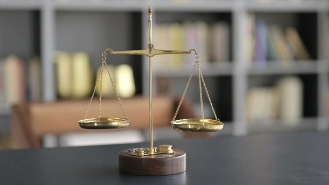 Gold Brass Balance Scale on Lawyer Office Table