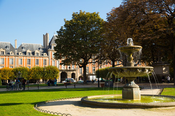 Place des Vosges with fountain, Paris