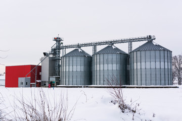 Fototapeta na wymiar Silos on rural farm in winter.