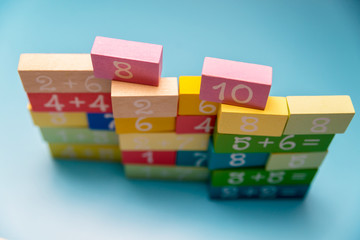 colored cubes with numbers on a blue background