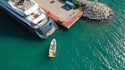 Fototapeta na wymiar Aerial photo of luxury yachts docked in Mediterranean marina
