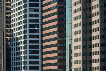 Fototapeta na wymiar Low angle view of modern office skyscrapers in city