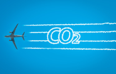 Airplane leaving jet contrails with CO2 word inside. Suitable for ecofriendly and sustainable...