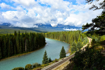 The bow river winding its way through the bow valley with rocky mountains in background.  Banff national park,  Alberta, Canada.