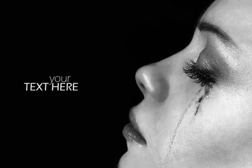 Woman with tears and copy space
