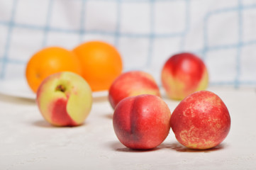 Ripe juicy nectarine with water drops.Fresh fruit nectarines healthy food.Vitamins are food for vegetarians.