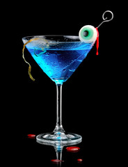 Blue bloody halloween cocktail with eye