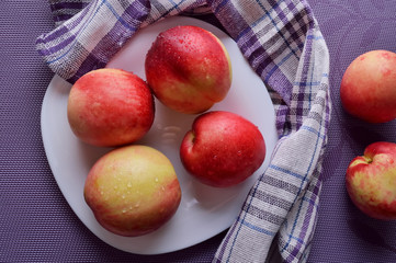 Ripe juicy nectarine with water drops.Fresh fruit nectarines healthy food.Vitamins are food for vegetarians.