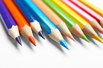 Fototapeta premium Different color pencils on white background, closeup