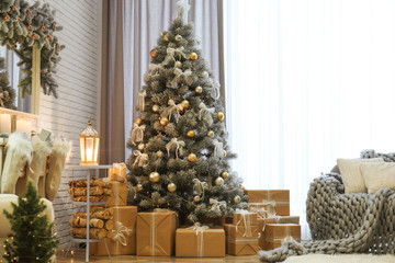 Room interior with decorated Christmas tree and gifts near window
