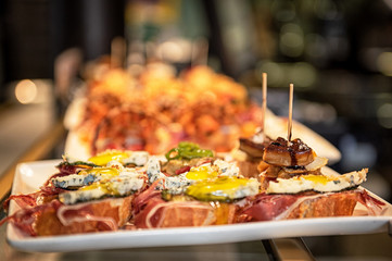 Close-up view of wide variety of tapas in Spain