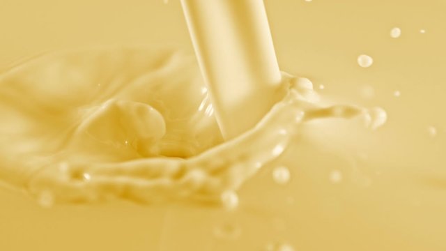 Super Slow Motion Shot of Pouring and Splashing Banana Milk at 1000fps.