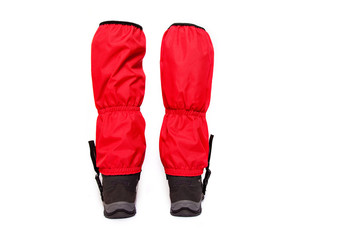 giaters and hiking boot on white background