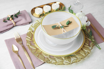 Elegant festive table setting on light background