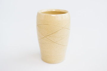 beige vase on a white background. minimalism style. interior decoration.