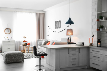 Modern room decorated for Halloween. Festive interior