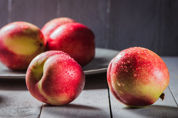 Fresh fruit nectarines healthy food.Harvest red and fresh nectarines . Pile of sweet fruits