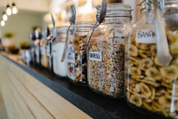 Assortment of breakfast cereals on counter in a cafe