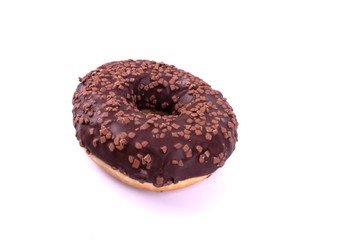 donut shaped donut shown on a white background. round, with a hole in the middle, chocolate coated and decorated