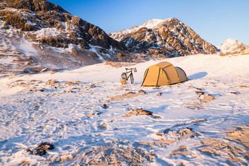 Camping on Lofoten islands in Norway in winter
