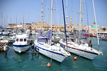 Fototapeta na wymiar boat in the sea - small sailing old city