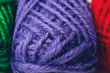 Colorful yarn balls as background, close up