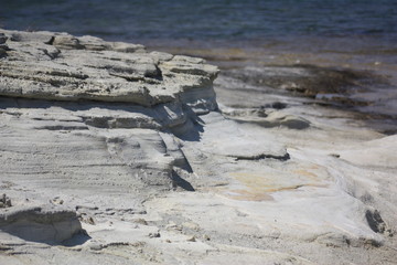 Eroded rocks by the sea in a remote mediterranean island